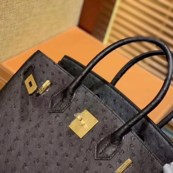 black ostrich leather birkin bag front close view pic